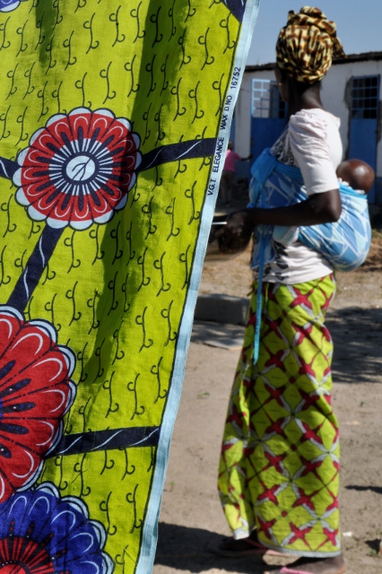 Sallah feeding the chickens
