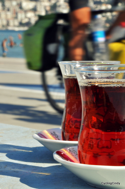My own asignment of a photo of the day: my lover seen behind chai glasses
