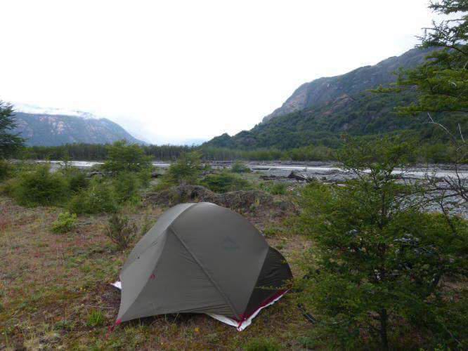 A very nice camp spot along a river in Patagonia. I liked to relax and read here...