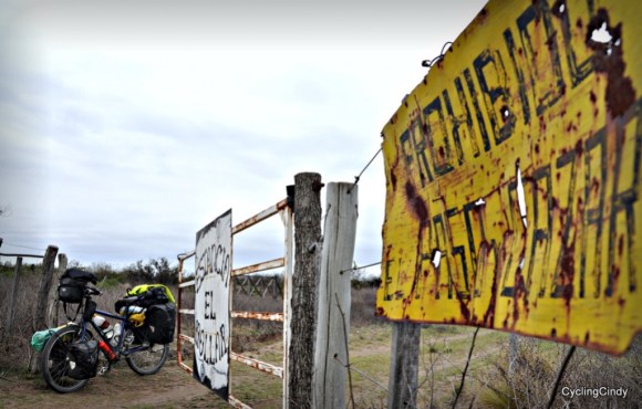 After a while you might learn to see which fences have a high chance to be open (such as regular use, where tire tracks are to be seen. Or the very opposite, years of neglect.